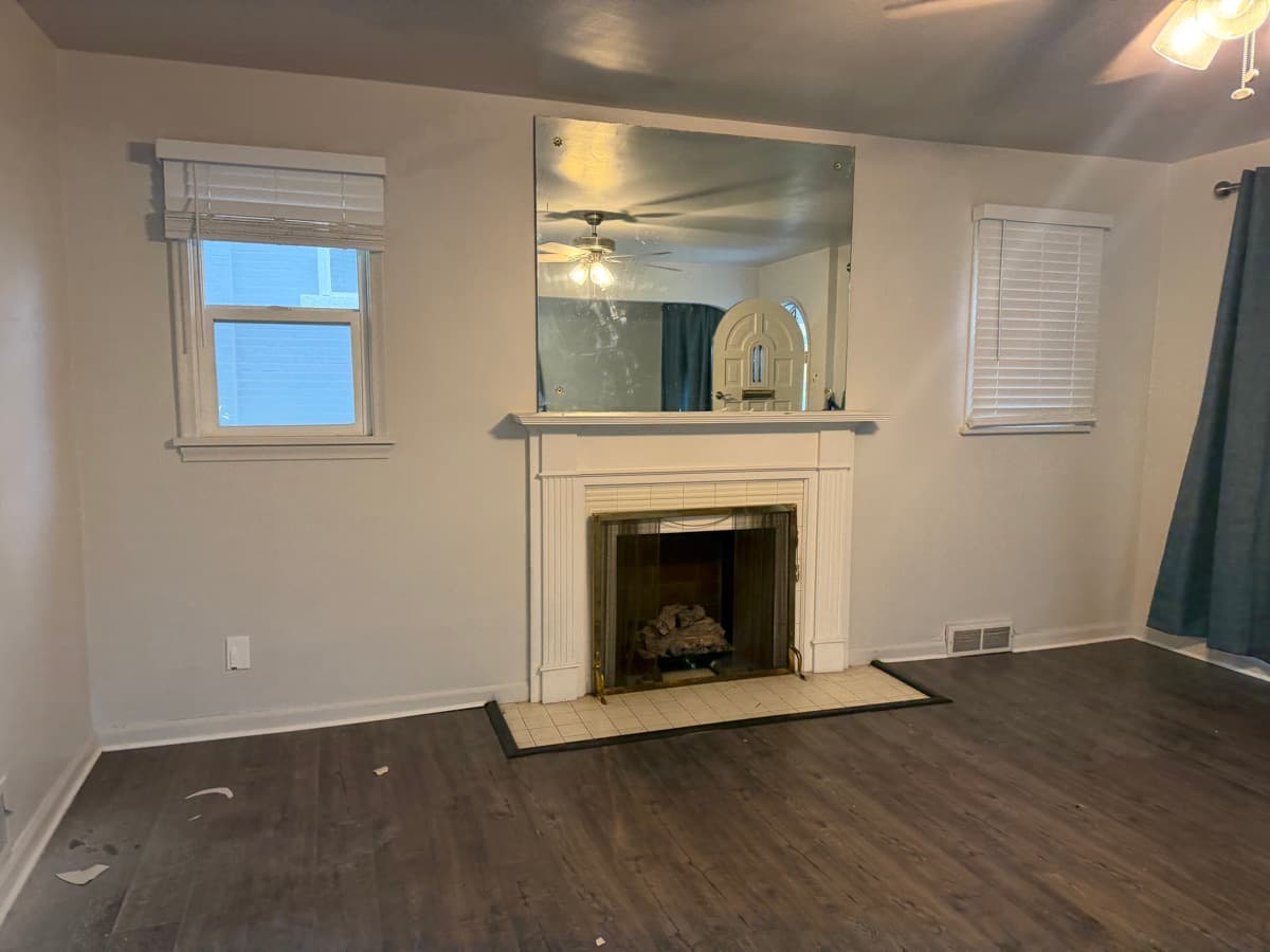 Living room cleaned by Sky House Cleaning, before