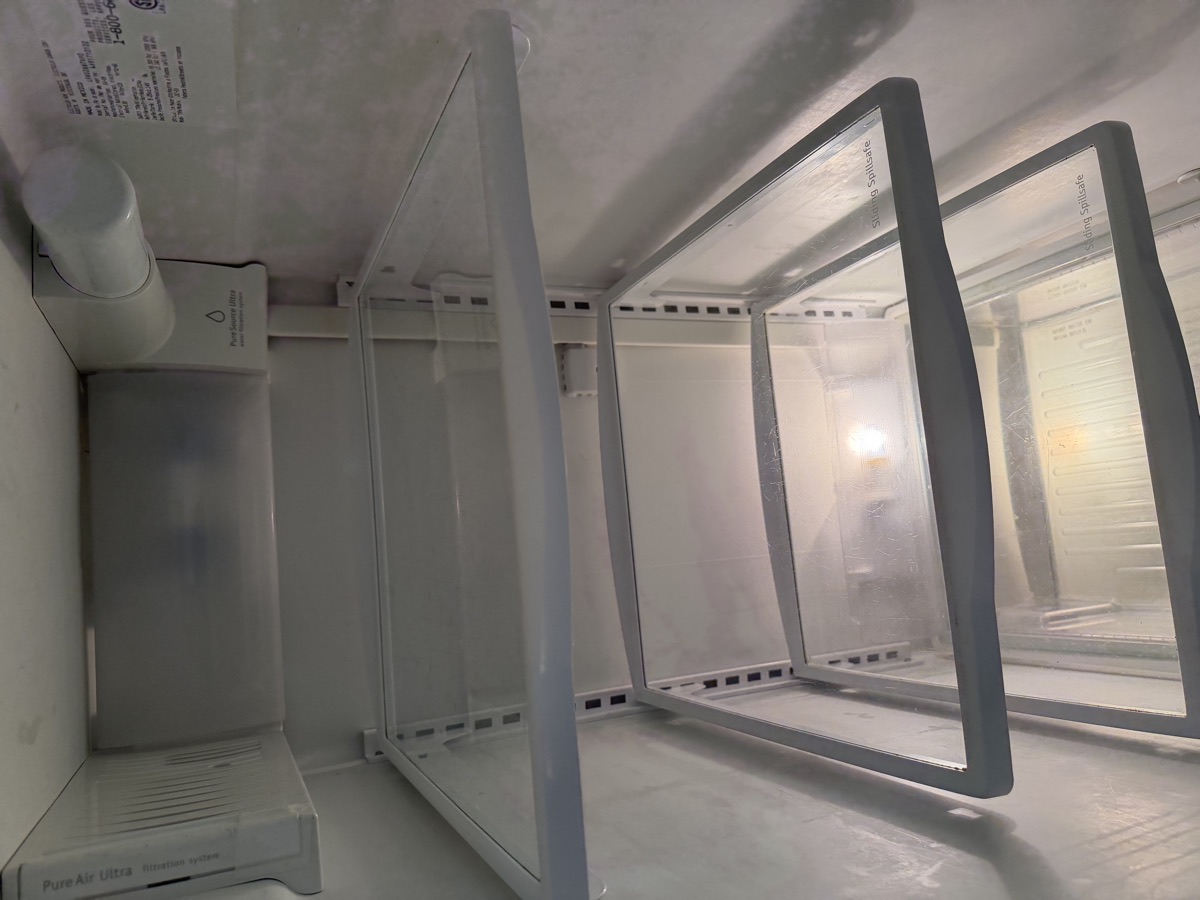 Refrigerator interior cleaned by Sky House Cleaning, after