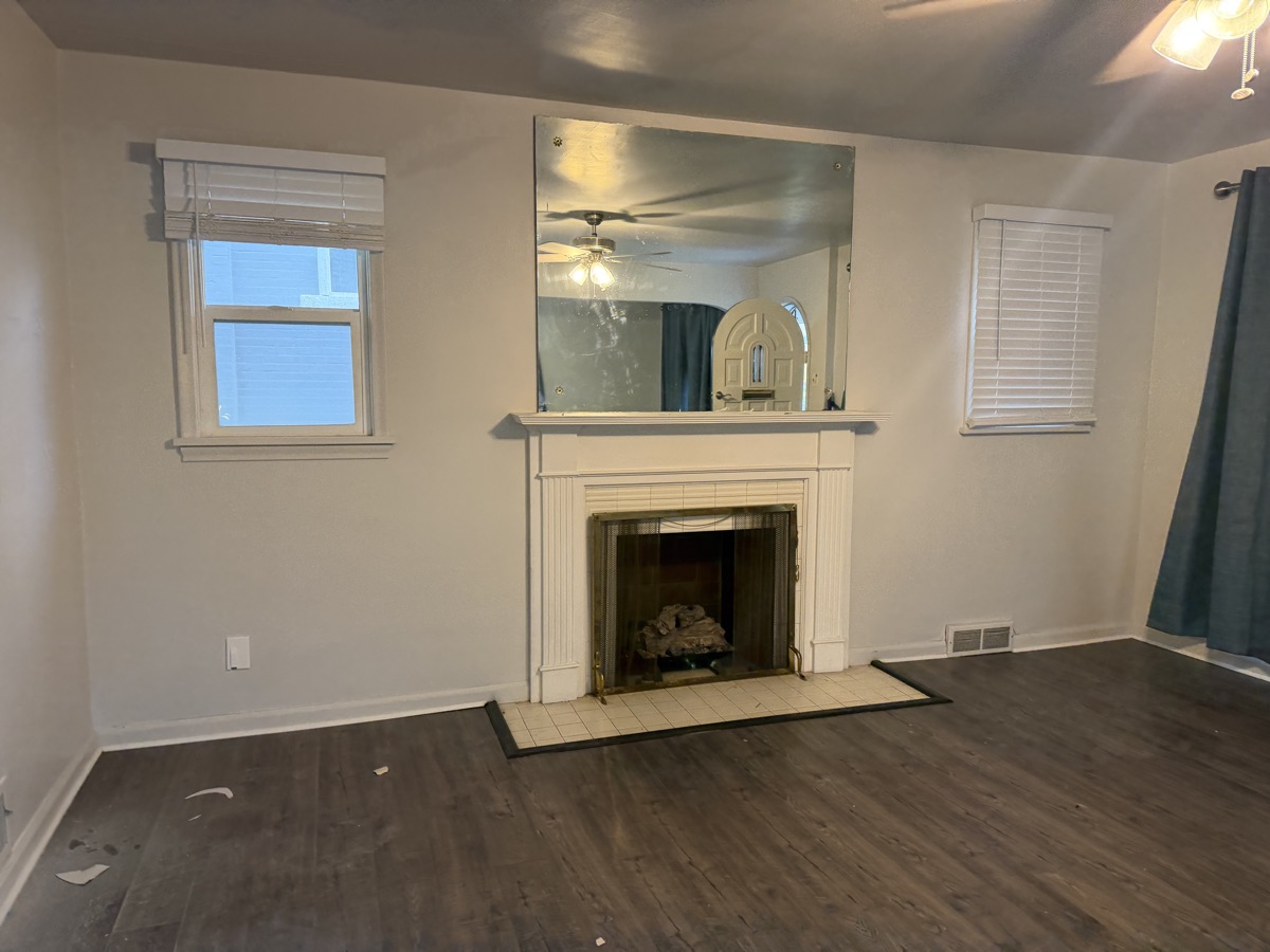Living room cleaned by Sky House Cleaning, before